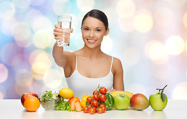Image showing happy woman with healthy food showing water glass