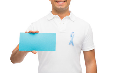 Image showing man with prostate cancer awareness ribbon and card