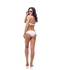 Image showing happy woman in sunglasses and bikini swimsuit