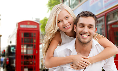 Image showing happy couple hugging over london city street
