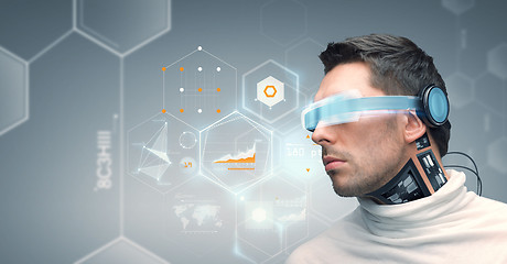 Image showing man with futuristic glasses and sensors