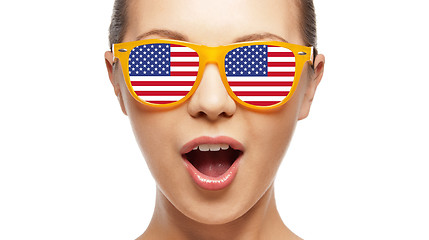 Image showing surprised girl in sunglasses with american flag