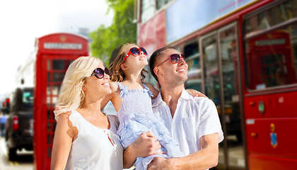 Image showing happy family in sunglasses over london city street