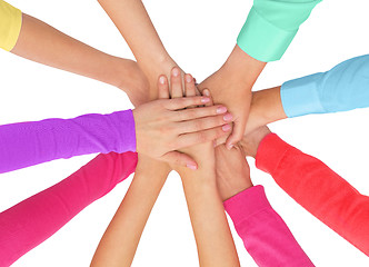Image showing close up of women hands on top in rainbow clothes