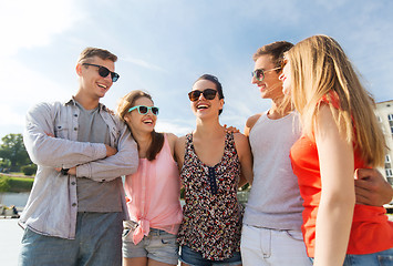 Image showing group of smiling friends in city