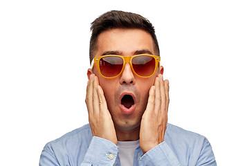 Image showing face of scared man in shirt and sunglasses