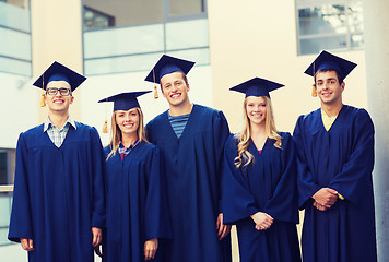 Image showing group of smiling students in mortarboards