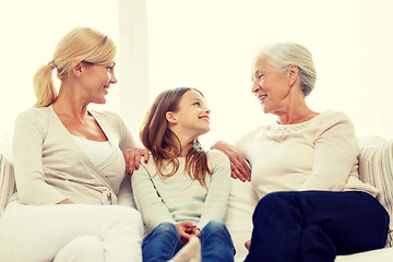 Image showing smiling family at home