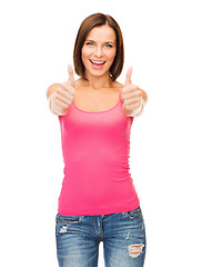 Image showing woman in blank pink tank top showing thumbs up
