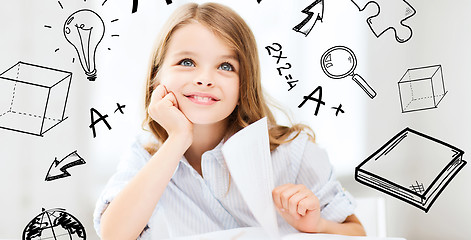 Image showing little student girl studying at school