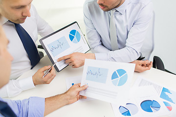 Image showing close up of businessman hands with clipboard