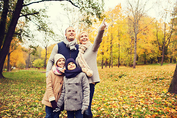 Image showing happy family in autumn park