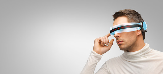 Image showing man with futuristic 3d glasses and sensors