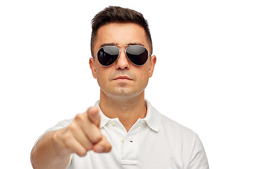 Image showing face of man in polo t-shirt and sunglasses