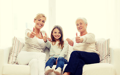 Image showing smiling family at home