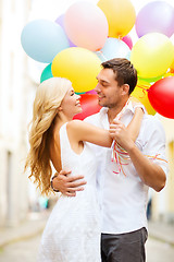 Image showing couple with colorful balloons