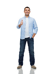 Image showing smiling man showing thumbs up