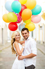 Image showing couple with colorful balloons