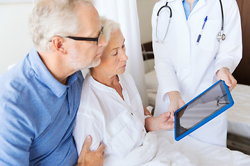 Image showing senior woman and doctor with tablet pc at hospital