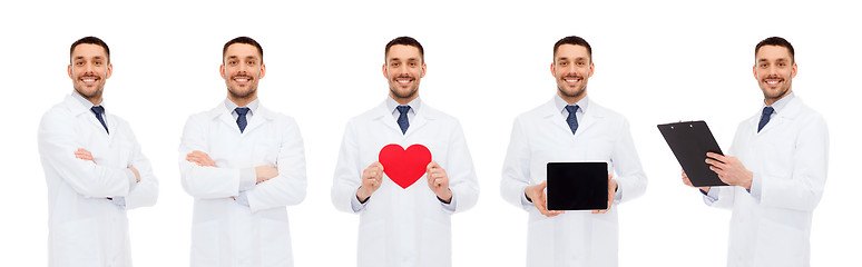 Image showing doctors with red heart, tablet pc and clipboard