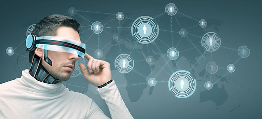 Image showing man with futuristic 3d glasses and sensors