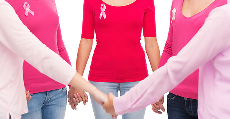 Image showing close up of women with cancer awareness ribbons