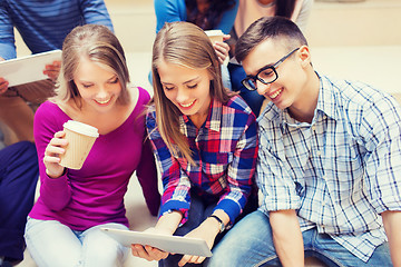 Image showing group of students with tablet pc and coffee cup