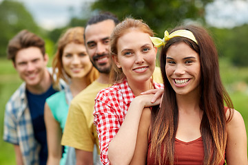 Image showing group of smiling friends outdoors