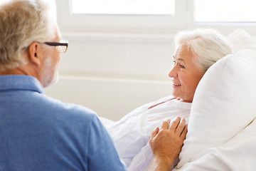 Image showing senior couple meeting at hospital ward