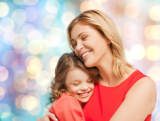 Image showing happy mother and daughter hugging