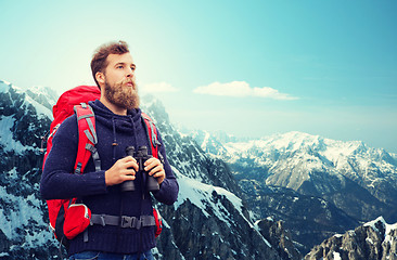 Image showing man with backpack and binocular outdoors