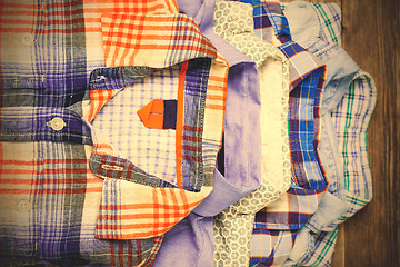 Image showing shirts in pile