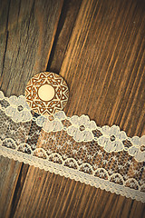 Image showing vintage button and lace tape