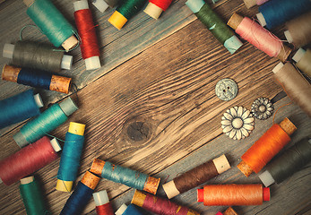 Image showing vintage reels of assorted thread and old buttons