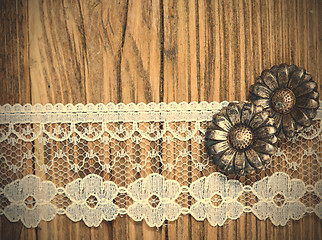 Image showing vintage button and lace tape