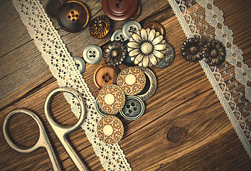 Image showing vintage buttons, lace, and a dressmaker scissors