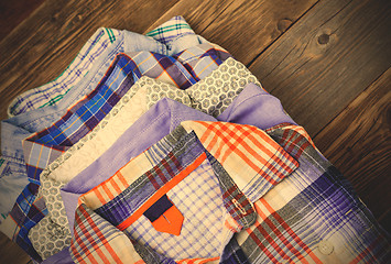 Image showing bright shirts in a pile