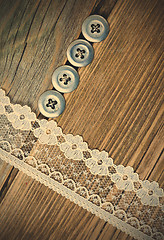 Image showing vintage button and lace tape