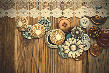 Image showing vintage button and lace tape