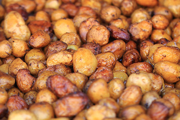 Image showing whole grilled potatoes