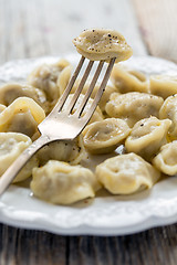 Image showing Dumpling on a fork.