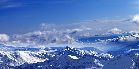 Image showing Panoramic view on sunlight snowy mountains