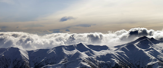 Image showing Panorama of evening mountains in clouds