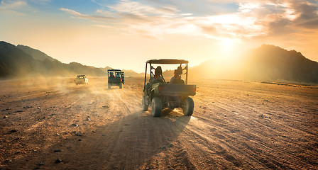 Image showing Buggies in desert