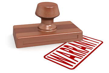 Image showing Wooden stamp warranty with red text