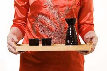 Image showing Serving saki