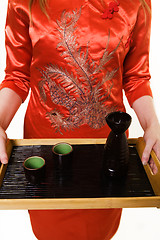 Image showing Serving saki