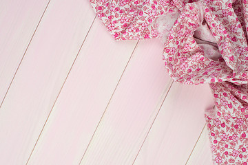 Image showing Pink towel over wooden table