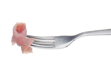 Image showing Slice of ham skewered on a fork 