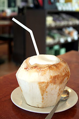 Image showing Drinking coconut